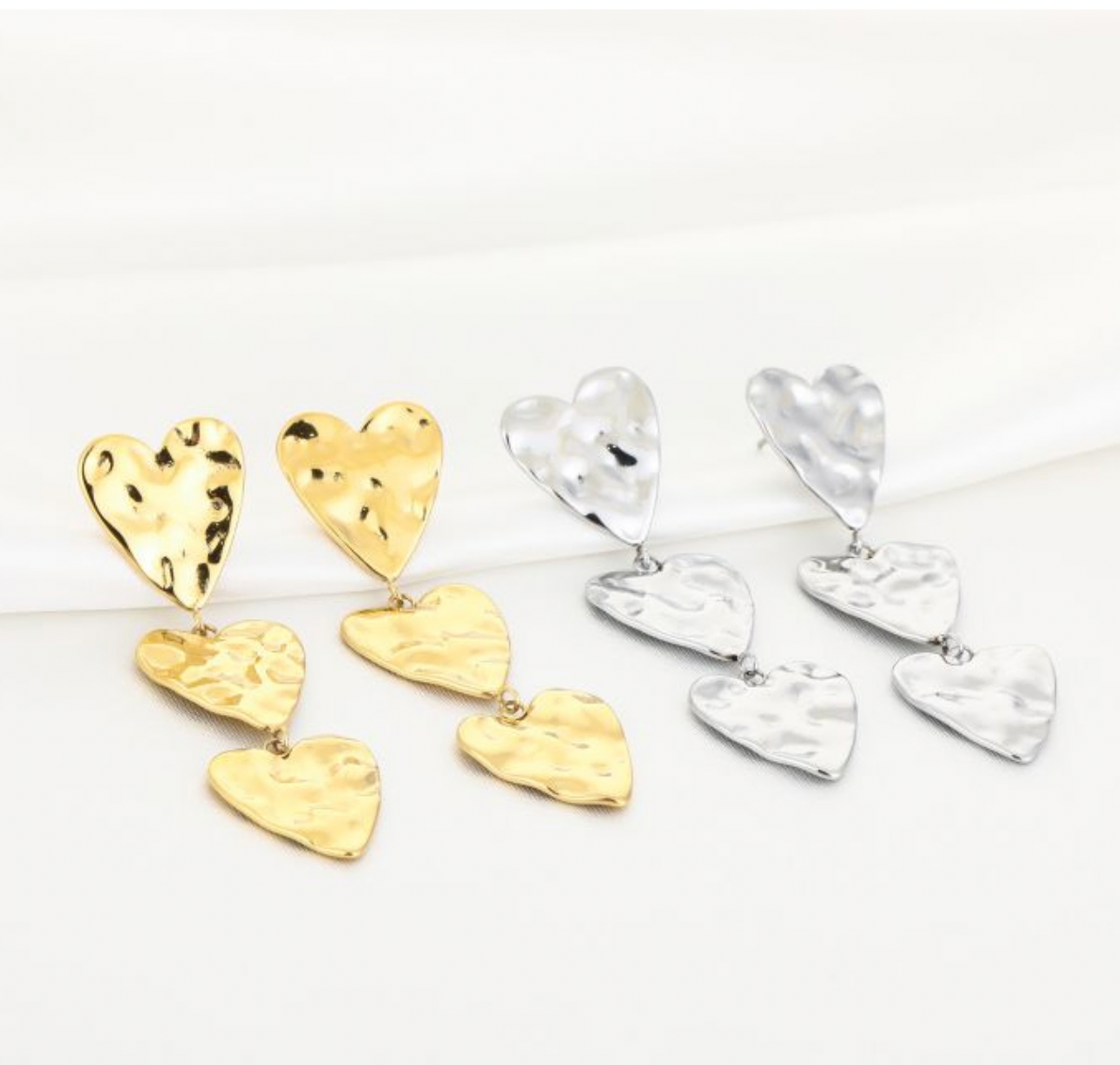 Triple hartjes oorbellen